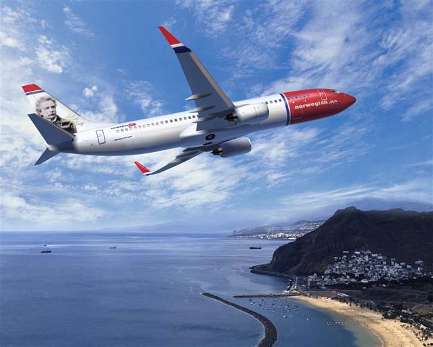 An Air plane of Norwegian AirLines over an island